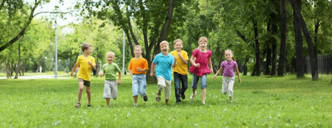 Group of happy kids running