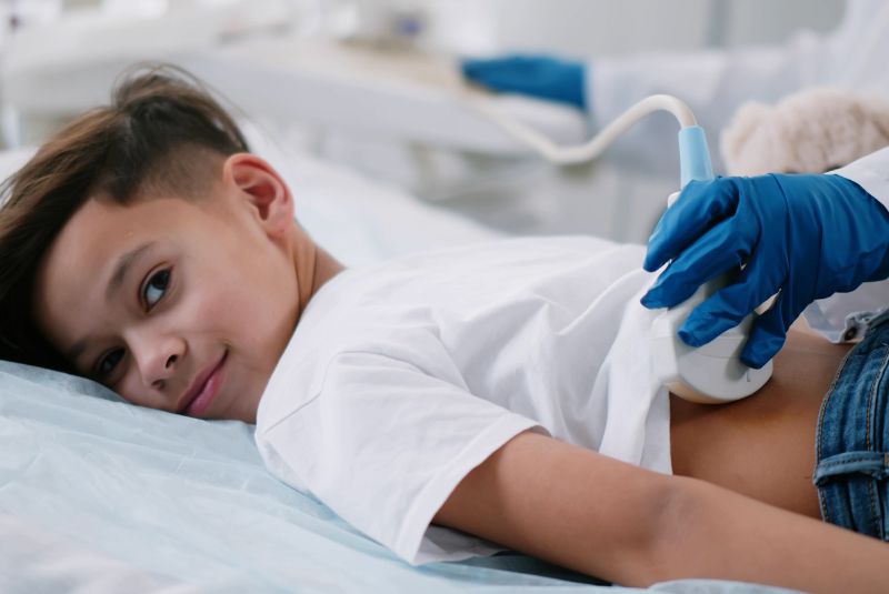 Child on bed during medical treatment