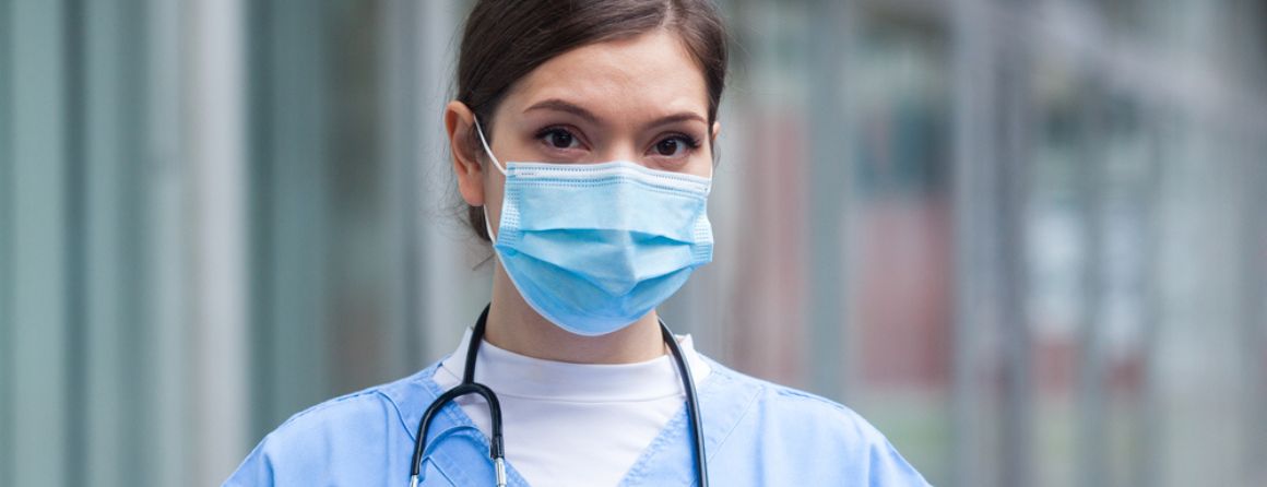 A doctor wearing a surgical mask