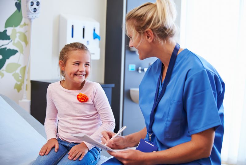 Smiling child and doctor