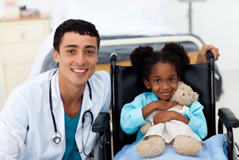 Childhood cancer doctor with patient