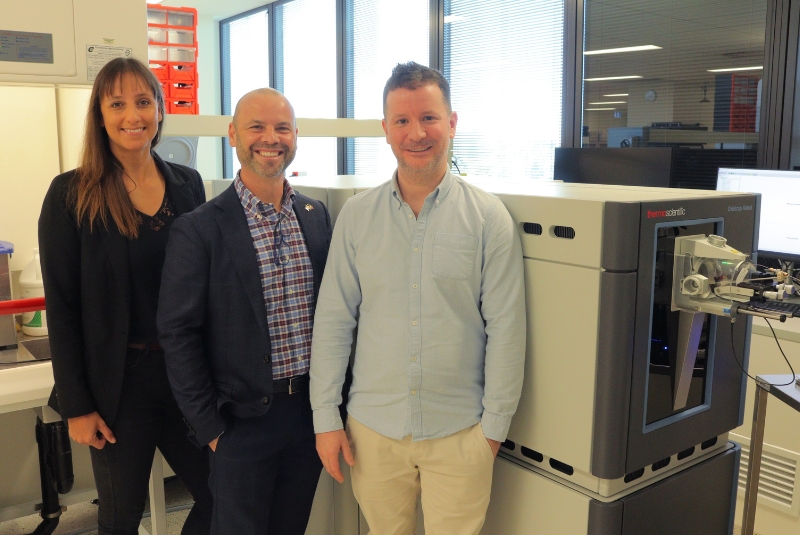 MCRI's Dr Sean Humphrey with Thermo FIsher Product Application Support Engineer Katharina Huber and Vice President and General Manager (Aus and NZ) Domenic Stranieri