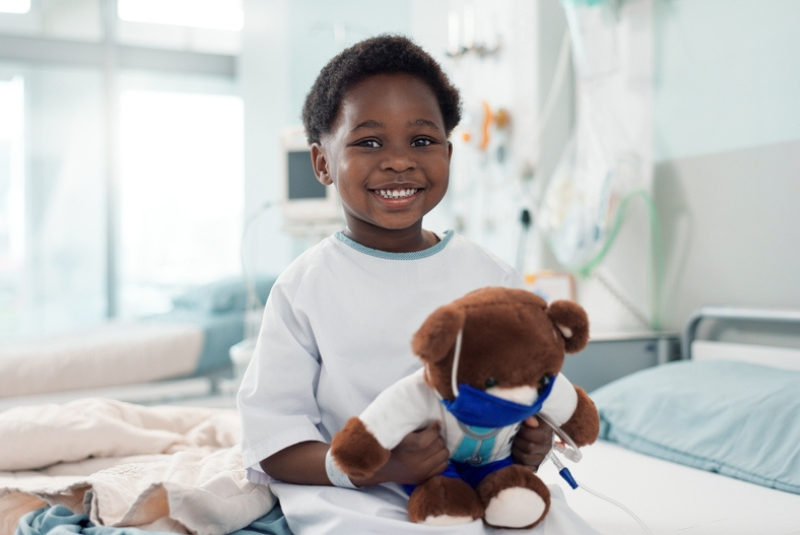 A child in hospital with a teddy