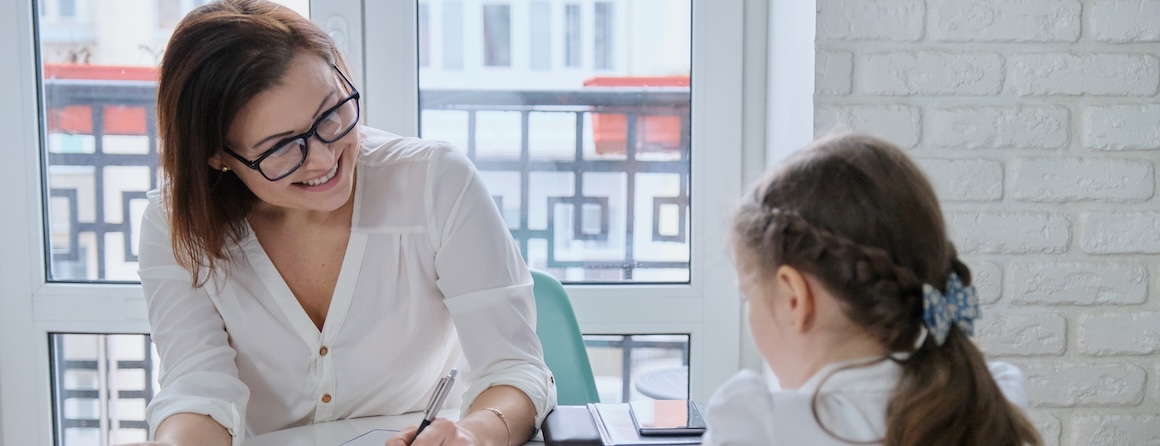 A child speaks to a GP, who under new training may soon be able to give ADHD diagnoses