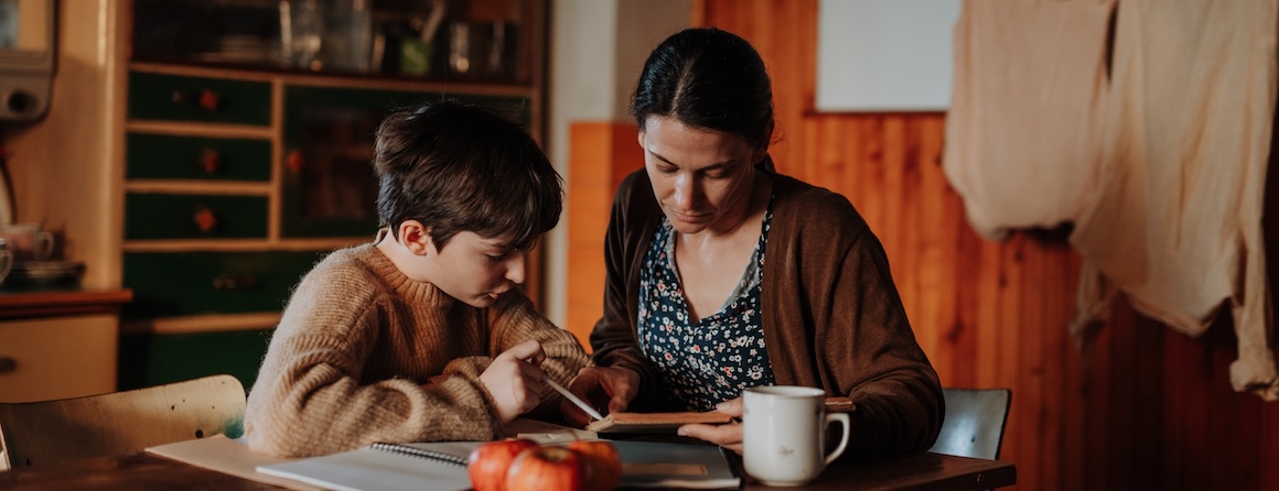 A mother and child studying