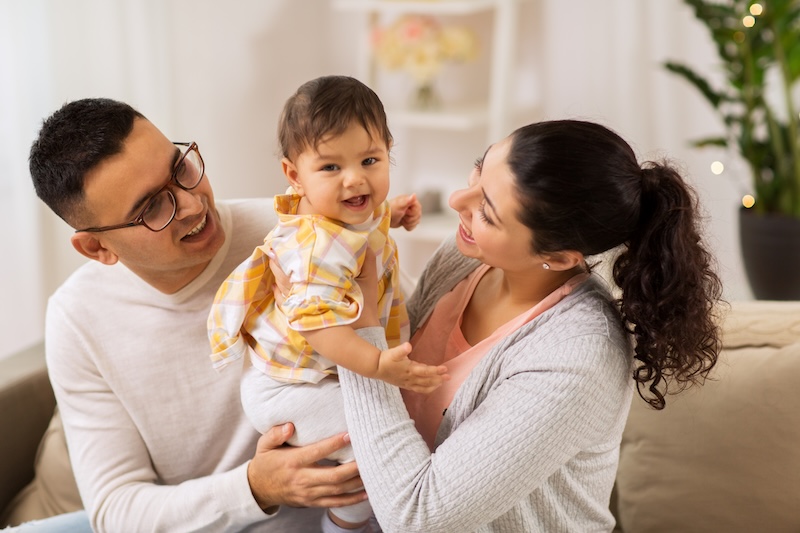 A father, child and mother