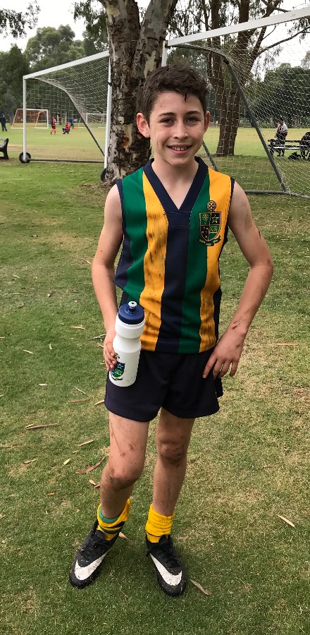Concussion victim Max at a footy game