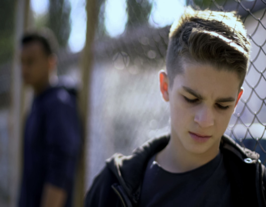 Teenage boy in juvenile detention