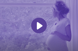 Video thumbnail showing woman holding pregnant belly