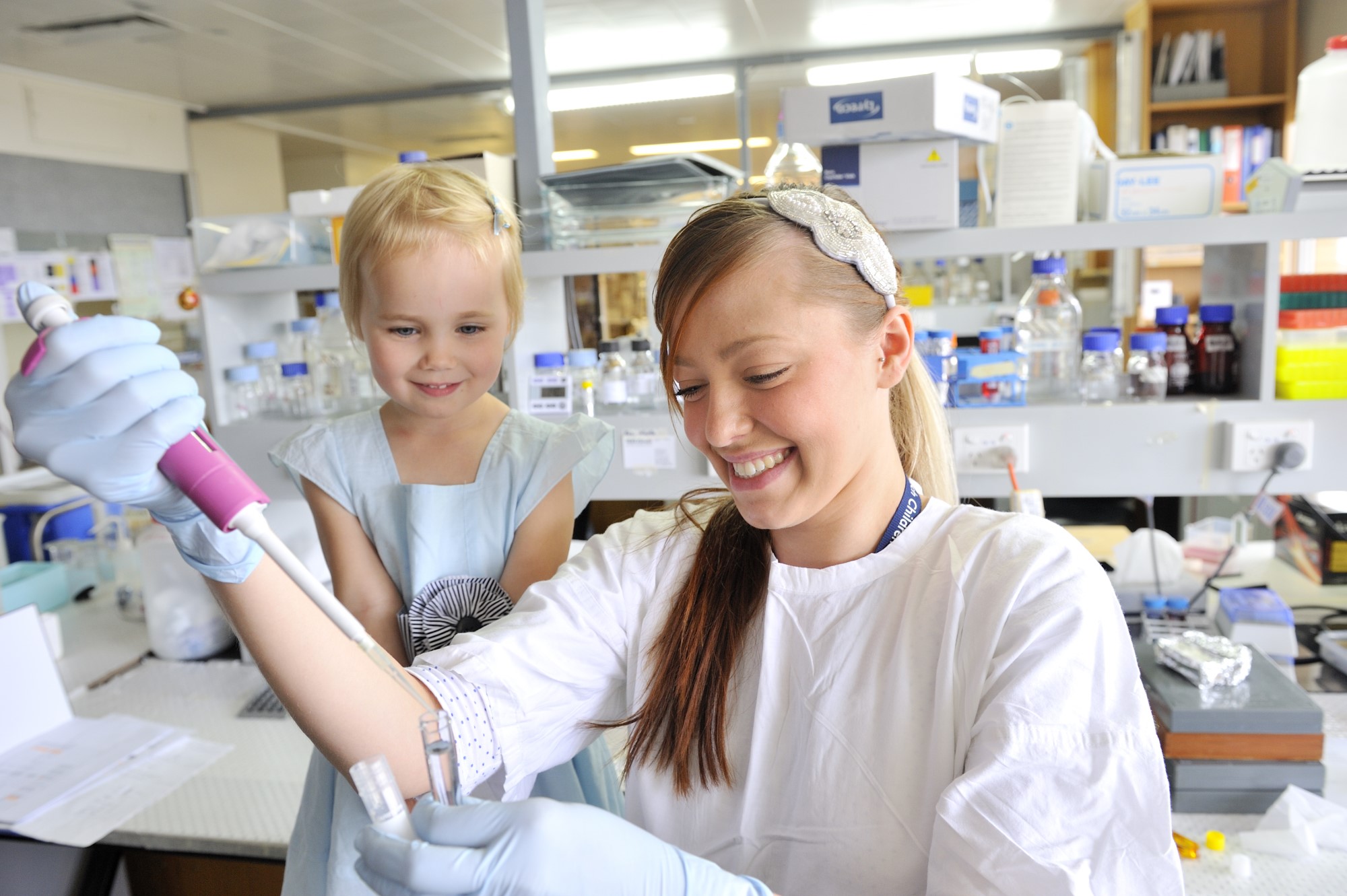 researcher and child in lab